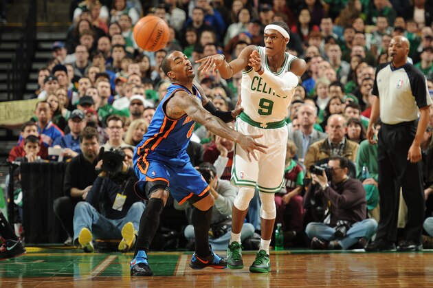BOSTON, MA - MARCH 4: Rajon Rondo #9 of the Boston Celtics passes the ball against J.R. Smith #8 of the New York Knicks on March 4, 2012 at the TD Garden in Boston, Massachusetts. NOTE TO USER: User expressly acknowledges and agrees that, by downloading and or using this photograph, User is consenting to the terms and conditions of the Getty Images License Agreement. Mandatory Copyright Notice: Copyright 2012 NBAE  (Photo by Brian Babineau/NBAE via Getty Images)
