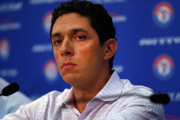 ARLINGTON, TX - SEPTEMBER 05:  President of Baseball Operations and General Manager Jon Daniels of the Texas Rangers talks with the media after announcing the resignation of Manager Ron Washington at Globe Life Park in Arlington on September 5, 2014 in Arlington, Texas. Ron Washington informed the club that he has chosen to resign in order to turn his full attention to addressing an off-the-field personal matter.  (Photo by Tom Pennington/Getty Images)