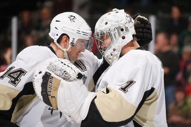 ST. PAUL, MN - NOVEMBER 4: (L-R) Chris Kunitz #14 and Thomas Greiss #1 of the Pittsburgh Penguins celebrate after defeating the Minnesota Wild on November 4, 2014 at the Xcel Energy Center in St. Paul, Minnesota. (Photo by Bruce Kluckhohn/NHLI via Getty Images)