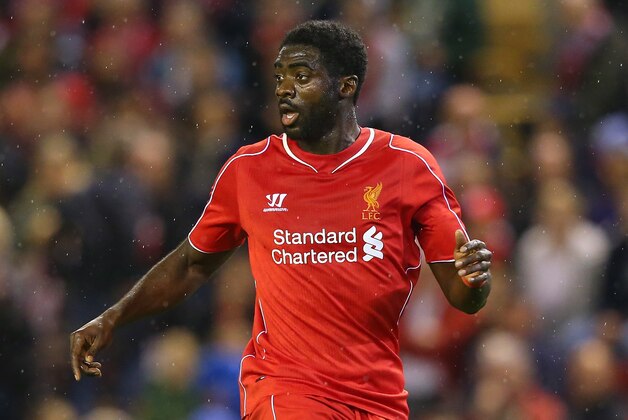 LIVERPOOL, ENGLAND - SEPTEMBER 23:  Kolo Toure of Liverpool controls the ball during the Capital One Cup Third Round match between Liverpool and Middlesbrough at Anfield on September 23, 2014 in Liverpool, England.  (Photo by Alex Livesey/Getty Images)