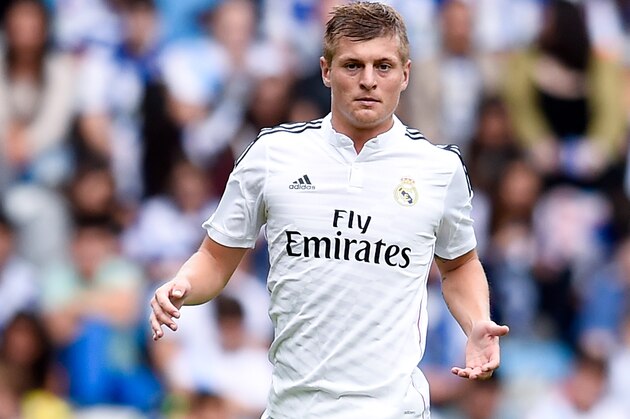 LA CORUNA, SPAIN - SEPTEMBER 20:  Toni Kroos of Real Madrid CF runs with the ball during the La Liga match between RC Deportivo La Coruna and Real Madrid CF at Riazor Stadium on September 20, 2014 in La Coruna, Spain.  (Photo by David Ramos/Getty Images)