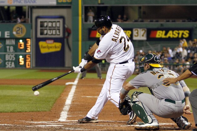 PITTSBURGH, PA - JULY 10:  Pedro Alvarez #24 of the Pittsburgh Pirates hits an RBI single in the fourth inning against the Oakland Athletics during the game on July 10, 2013 at PNC Park in Pittsburgh, Pennsylvania.  (Photo by Justin K. Aller/Getty Images)