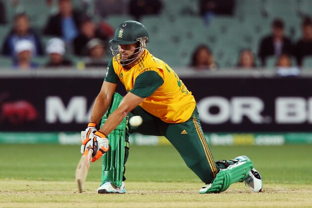 ADELAIDE, AUSTRALIA - NOVEMBER 05: Rilee Rossouw of South Africa plays a reverse sweep during game one of the International Twenty20 Series between Australia and South Africa at Adelaide Oval on November 5, 2014 in Adelaide, Australia.  (Photo by Morne de Klerk/Getty Images)