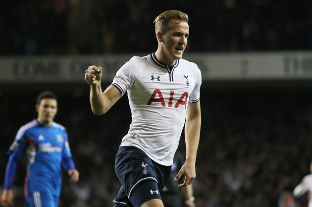 Tottenham's Harry Kane celebrates after scoring a goal during their English League Cup soccer match between Tottenham Hotspur and Hull City at the White Hart Lane stadium in London Wednesday, Oct. 30, 2013. (AP Photo/Alastair Grant)