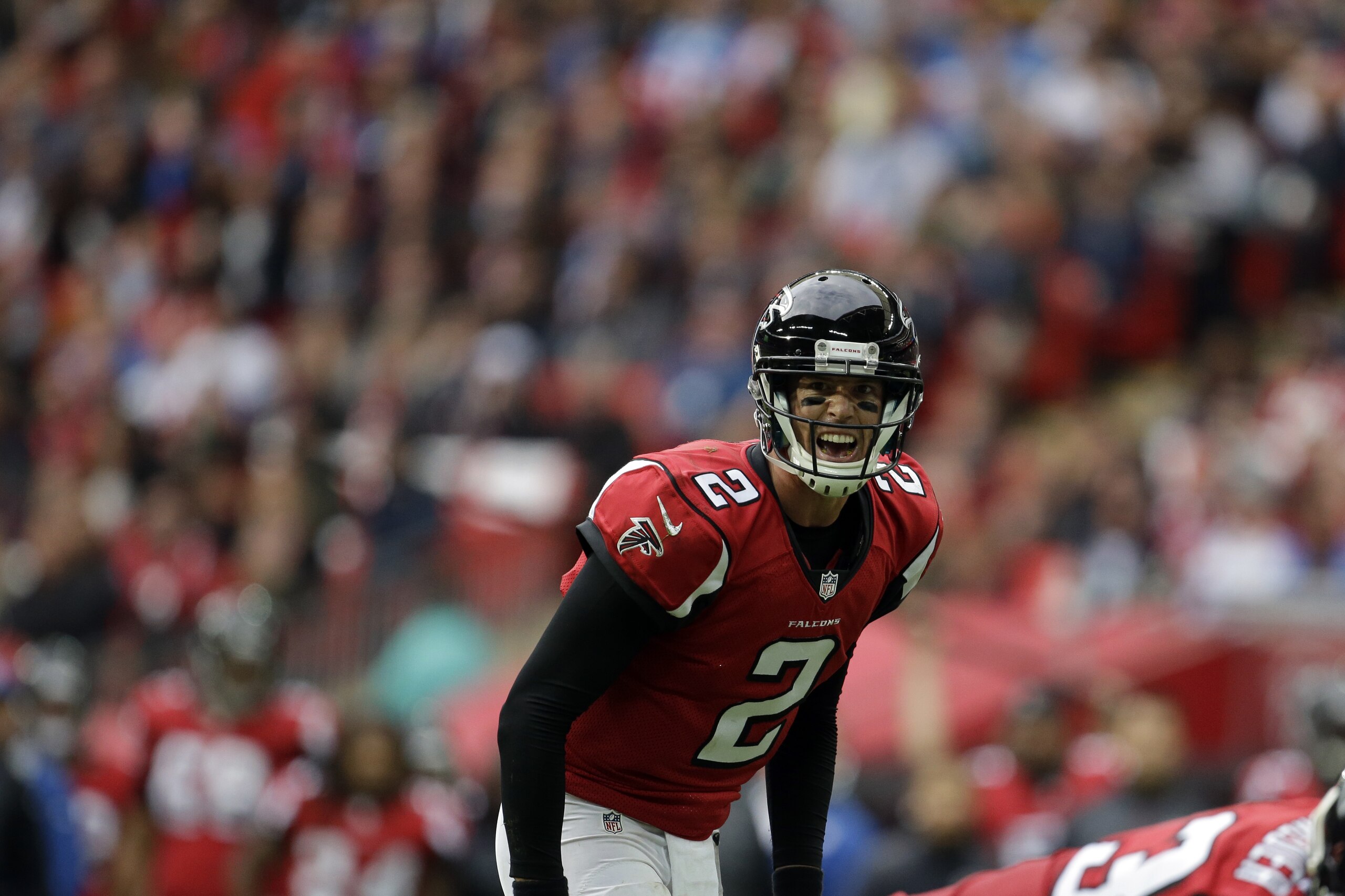Atlanta Falcons quarterback Matt Ryan (2) calls a play in the first half of the NFL football game against the Detroit Lions at Wembley Stadium, London, Sunday, Oct. 26, 2014.  (AP Photo/Matt Dunham)