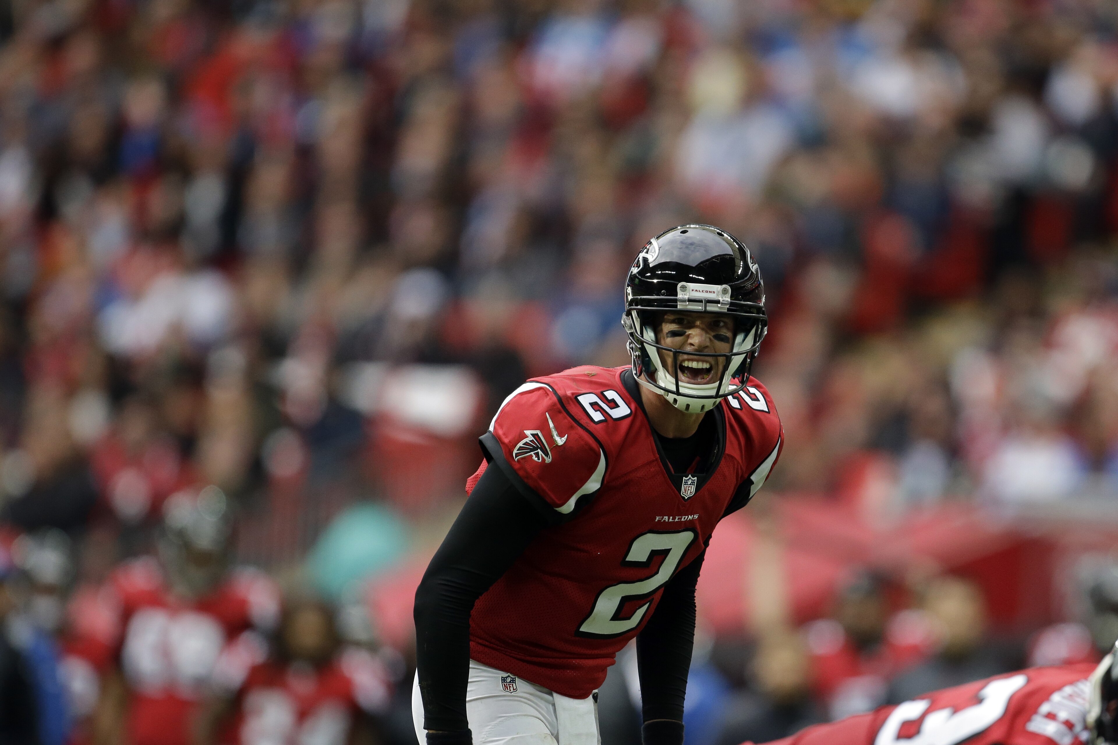 Atlanta Falcons quarterback Matt Ryan (2) calls a play in the first half of the NFL football game against the Detroit Lions at Wembley Stadium, London, Sunday, Oct. 26, 2014.  (AP Photo/Matt Dunham)