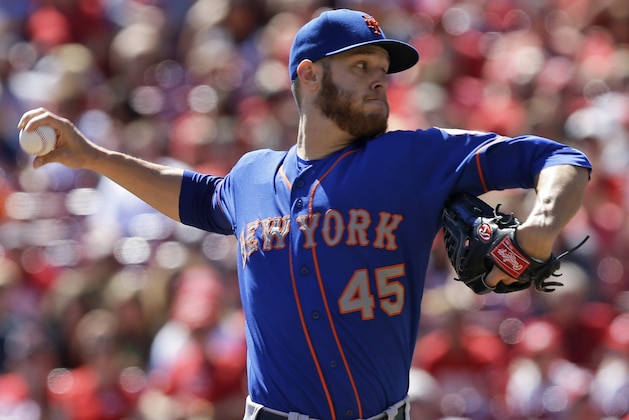 New York Mets starting pitcher Zack Wheeler throws against the Cincinnati Reds in the first inning of a baseball game, Sunday, Sept. 7, 2014, in Cincinnati. (AP Photo/Al Behrman)
