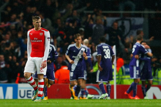 LONDON, ENGLAND - NOVEMBER 04:  Despair for Calum Chambers of Arsenal (21) as Aleksandar Mitrovic of Anderlecht (not pictured) scores their third goal during the UEFA Champions League Group D match between Arsenal FC and RSC Anderlecht at Emirates Stadium on November 4, 2014 in London, United Kingdom.  (Photo by Michael Regan/Getty Images)