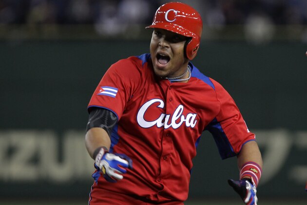 TOKYO, JAPAN - MARCH 11:  Outfielder Yasmany Tomas # 27 of Cuba reacts after hitting a RBI single in the eighth inning during the World Baseball Classic Second Round Pool 1 game between Cuba and the Netherlands at Tokyo Dome on March 11, 2013 in Tokyo, Japan.  (Photo by Chung Sung-Jun/Getty Images)