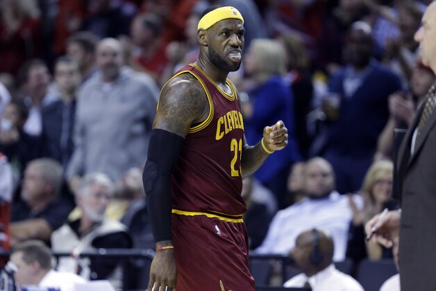 Cleveland Cavaliers forward LeBron James is shown during the second half of an NBA basketball game against the Portland Trail Blazers  in Portland, Ore., Tuesday, Nov. 4, 2014.(AP Photo/Don Ryan)