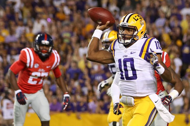 BATON ROUGE, LA - OCTOBER 25:  Anthony Jennings #10 of the LSU Tigers throws a pass against the Mississippi Rebels at Tiger Stadium on October 25, 2014 in Baton Rouge, Louisiana.  (Photo by Chris Graythen/Getty Images)