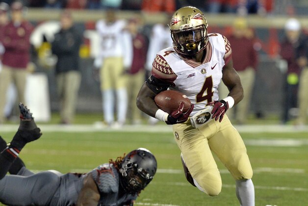 Florida State's Dalvin Cook, right, in action during the second half of their NCAA college football game in Louisville, Ky., Thursday, Oct. 30, 2014. (AP Photo/Timothy D. Easley)