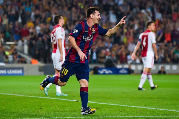 BARCELONA, SPAIN - OCTOBER 21:  Lionel Messi of FC Barcelona celebrates after scoring his team's second goal during a UEFA Champions League Group F match between FC Barcelona and AFC Ajax at the Camp Nou Stadium on October 21, 2014 in Barcelona, Spain.  (Photo by David Ramos/Getty Images)