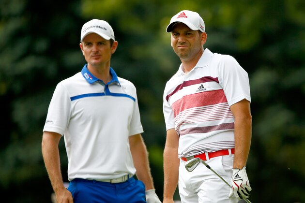 AKRON, OH - AUGUST 02: Sergio Garcia of Spain watches his shot off the seventh tee as Justin Rose of England looks on during the third round of the World Golf Championships-Bridgestone Invitational at Firestone Country Club South Course on August 2, 2014 in Akron, Ohio.  (Photo by Sam Greenwood/Getty Images)