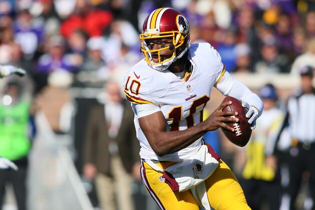 MINNEAPOLIS, MN - NOVEMBER 2:  Robert Griffin III #10 of the Washington Redskins looks to pass the ball against the Minnesota Vikings during the first quarter on November 2, 2014 at TCF Bank Stadium in Minneapolis, Minnesota. (Photo by Adam Bettcher/Getty Images)