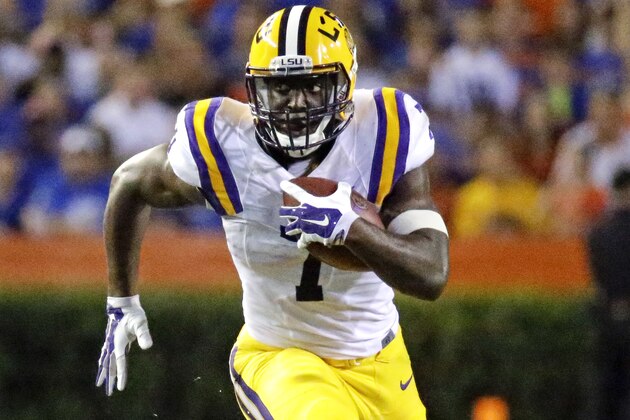LSU running back Leonard Fournette runs against Florida during the first half of an NCAA college football game in Gainesville, Fla., Saturday, Oct. 11, 2014. (AP Photo/John Raoux)