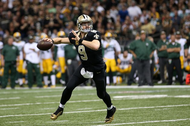 NEW ORLEANS, LA - OCTOBER 26:  Drew Brees #9 of the New Orleans Saints agains the Green Bay Packers at Mercedes-Benz Superdome on October 26, 2014 in New Orleans, Louisiana.  (Photo by Chris Graythen/Getty Images)