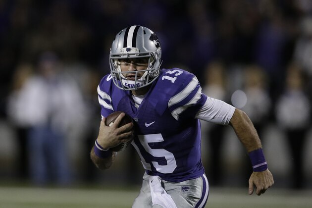 Kansas State quarterback Jake Waters (15) during the first half of an NCAA college football game against Oklahoma State in Manhattan, Kan., Saturday, Nov. 1, 2014. (AP Photo/Orlin Wagner)