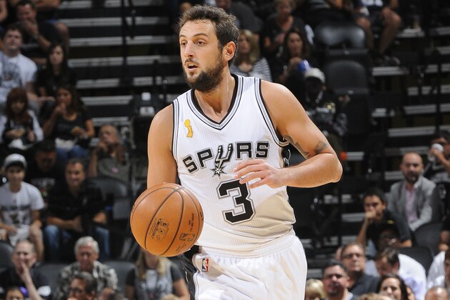 SAN ANTONIO, TX - OCTOBER 28: Marco Belinelli #3 of the San Antonio Spurs handles the ball against the Dallas Mavericsk at the AT&T Center on October 28, 2014 in San Antonio, Texas. NOTE TO USER: User expressly acknowledges and agrees that, by downloading and or using this photograph, user is consenting to the terms and conditions of the Getty Images License Agreement. Mandatory Copyright Notice: Copyright 2014 NBAE (Photos by D. Clarke Evans/NBAE via Getty Images)