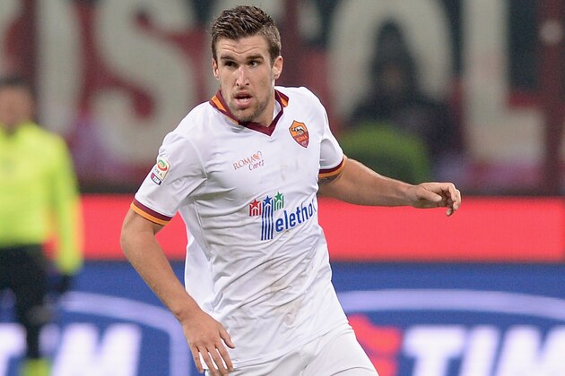 MILAN, ITALY - DECEMBER 16:  Kevin Strootman of AS Roma in action during the Serie A match between AC Milan and AS Roma at San Siro Stadium on December 16, 2013 in Milan, Italy.  (Photo by Claudio Villa/Getty Images)