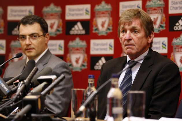 Liverpool's new manager Kenny Dalglish, right, and Liverpool Director of Football Damien Comolli talk to the media during a press conference at Anfield stadium in Liverpool, England, Monday Jan. 10, 2011. (AP Photo/Tim Hales)