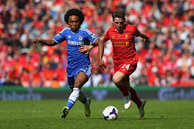 LIVERPOOL, ENGLAND - APRIL 27:  Willian of Chelsea and Joe Allen of Liverpool compete for the ball during the Barclays Premier League match between Liverpool and Chelsea at Anfield on April 27, 2014 in Liverpool, England.  (Photo by Clive Brunskill/Getty Images)
