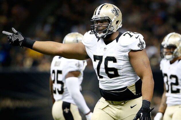 NEW ORLEANS, LA - AUGUST 15:  Akiem Hicks #76 of the New Orleans Saints reacts to a call during a preseason game against the Tennessee Titans at the Mercedes-Benz Superdome on August 15, 2014 in New Orleans, Louisiana.  (Photo by Stacy Revere/Getty Images)