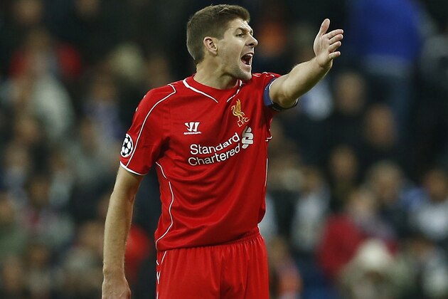 Liverpool's Steven Gerrard gestures and shouts during a Group B Champions League soccer match between Real Madrid and Liverpool at the Santiago Bernabeu stadium in Madrid, Spain, Tuesday Nov. 4, 2014. (AP Photo/Andres Kudacki)