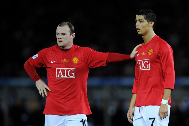 YOKOHAMA, JAPAN - DECEMBER 21:  Wayne Rooney of Manchester United with team-mate Cristiano Ronaldo during the FIFA Club World Cup Japan 2008 Final match between Manchester United and Liga De Quito at the International Stadium Yokohama on December 21, 2008 in Yokohama, Kanagawa, Japan.  (Photo by Shaun Botterill/Getty Images)