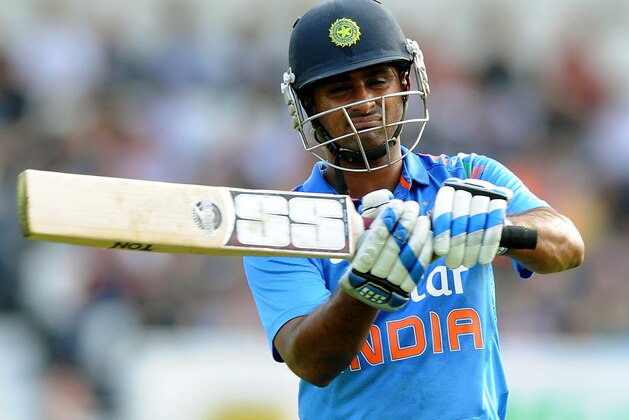 India's Ambati Rayudu reacts after being bowled by England's Ben Stokes caught Alastair Cook for 53 runs during the fifth One Day International match between England and India at Headingley cricket ground, Leeds, England, Friday, Sept 5, 2014. (AP Photo/Rui Vieira)