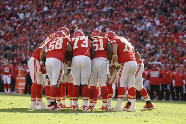 Kansas City Chiefs players huddle in the second half of an NFL football game against the New York Jets in Kansas City, Mo., Sunday, Nov. 2, 2014. (AP Photo/Charlie Riedel)