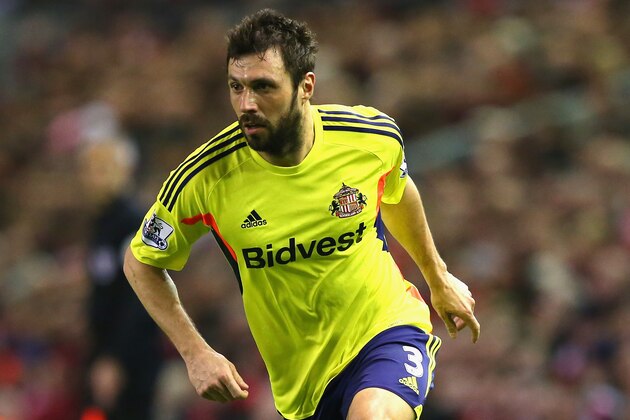 LIVERPOOL, ENGLAND - MARCH 26:  Andrea Dossena of Sunderland in action during the Barclays Premier League match between Liverpool and Sunderland at Anfield on March 26, 2014 in Liverpool, England.  (Photo by Alex Livesey/Getty Images)
