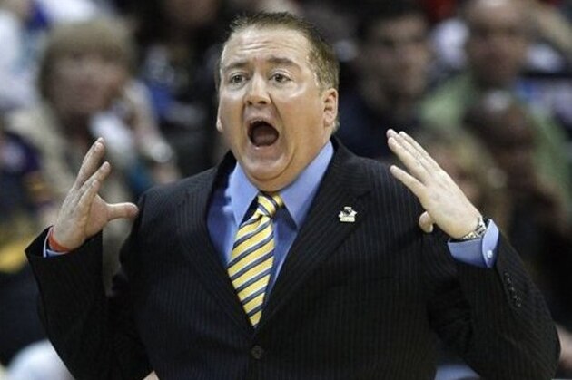 FILE - In this March 17, 2011, file photo, Morehead State coach Donnie Tyndall reacts during the first half against Louisville in a Southwest regional second round NCAA tournament college basketball game in Denver.  A person familiar with the move says Southern Miss has agreed to terms with Morehead State's Donnie Tyndall to be the next Golden Eagles men's basketball coach. The person spoke to The Associated Press Saturday on condition of anonymity because no announcement by either school had been made. The person says Tyndall has agreed to a four-year deal and that he is expected to be introduced Monday. (AP Photo/Ed Andrieski, File)