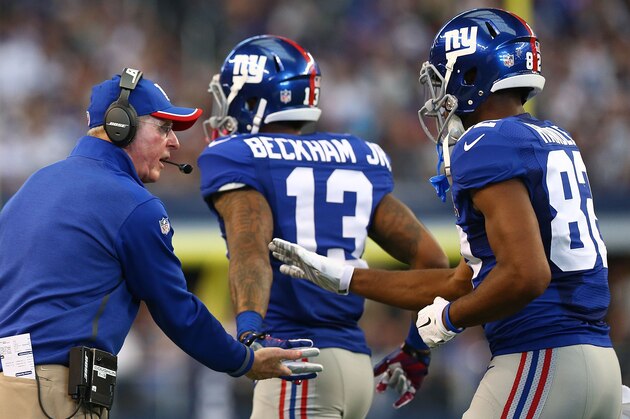 ARLINGTON, TX - OCTOBER 19:  Head coach Tom Coughlin of the New York Giants celebrates with Odell Beckham Jr. #13 of the New York Giants and Rueben Randle #82 of the New York Giants against the Dallas Cowboys in the first half at AT&T Stadium on October 19, 2014 in Arlington, Texas.  (Photo by Ronald Martinez/Getty Images)