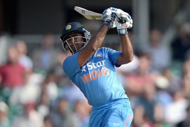 LEEDS, ENGLAND - SEPTEMBER 05:  Ambati Rayudu of India hits out for six runs during the 5th Royal London One Day International between England and India at Headingley on September 5, 2014 in Leeds, England.  (Photo by Gareth Copley/Getty Images)