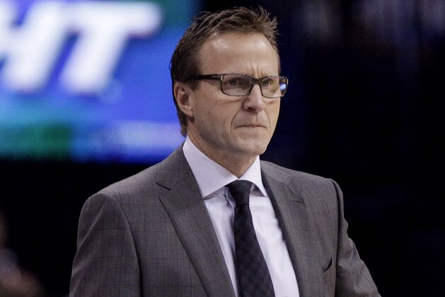 Oklahoma City Thunder Head Coach Scott Brooks looks on in the first half of an NBA basketball game in Oklahoma City, Saturday, Nov. 1, 2014. (AP Photo/Garett Fisbeck)