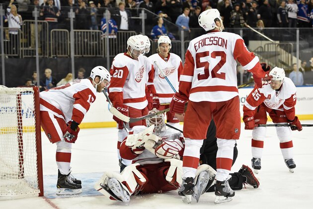 NEW YORK, NY - NOVEMBER 05:  Jonas Gustavsson #50 of the Detroit Red Wings lies injured on the ice after giving up the game winning overtime goal to Derick Brassard #16 of the New York Rangers during there game at Madison Square Garden on November 5, 2014 in New York City.  (Photo by Al Bello/Getty Images)