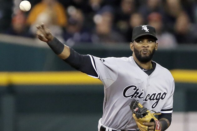DETROIT, MI - SEPTEMBER 22:  Shortstop Alexei Ramirez #10 of the Chicago White Sox throws to first base on a ground ball off the bat of Torii Hunter of the Detroit Tigers but is wide of the base during the fifth inning at Comerica Park on September 22, 2014, in Detroit, Michigan. (Photo by Duane Burleson/Getty Images)