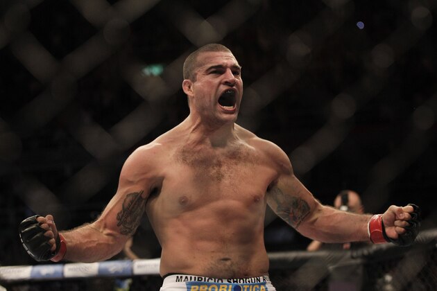 Brazil's Shogun Rua celebrates after defeating Forrest Griffin of the U.S. in the first round of their light heavyweight mixed martial arts bout at the Ultimate Fighting Championship (UFC) 134 in Rio de Janeiro, Brazil, Saturday Aug. 27, 2011. (AP Photo/Felipe Dana)