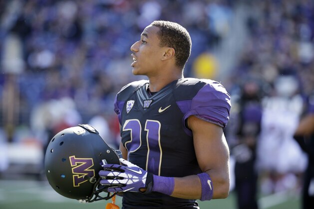 Washington's Marcus Peters walks on the field against Stanford in an NCAA football game Saturday, Sept. 27, 2014, in Seattle. (AP Photo/Elaine Thompson)