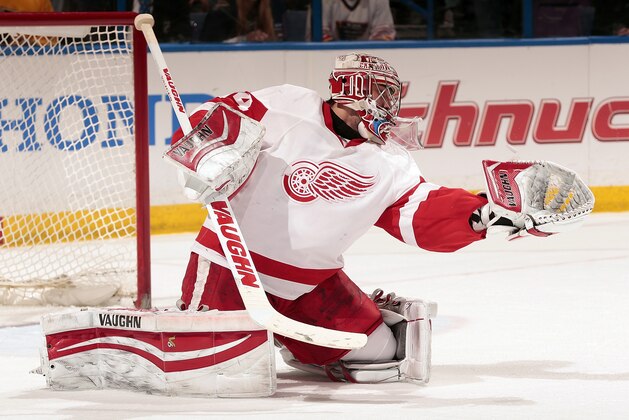 ST. LOUIS, MO - APRIL 13: Petr Mrazek #34 of the Detroit Red Wings defends against the St. Louis Blues during an NHL game on April 13, 2014 at Scottrade Center in St. Louis, Missouri. (Photo by Mark Buckner/NHLI via Getty Images)