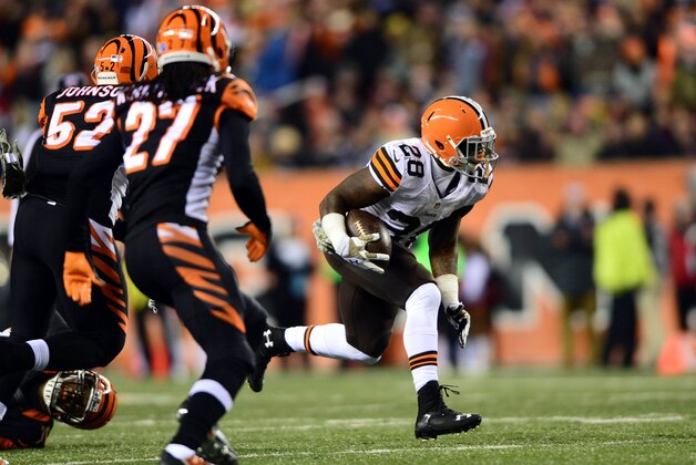 Nov 6, 2014; Cincinnati, OH, USA; Cleveland Browns running back Terrance West (28) runs the ball during the third quarter against the Cincinnati Bengals at Paul Brown Stadium. Mandatory Credit: Andrew Weber-USA TODAY Sports