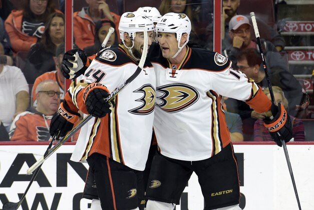 Oct 14, 2014; Philadelphia, PA, USA; Anaheim Ducks center Ryan Kesler (17) celebrates his goal with defenseman Hampus Lindholm (47) and center Nate Thompson (44) against the Philadelphia Flyers during the first period at Lincoln Financial Field. Mandatory Credit: Eric Hartline-USA TODAY Sports