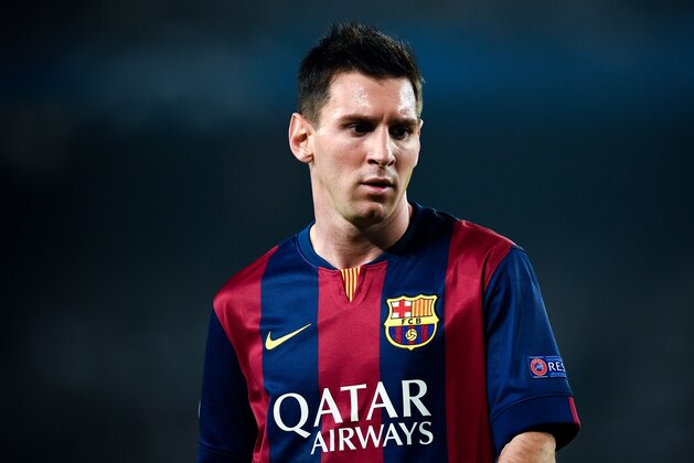 BARCELONA, SPAIN - OCTOBER 21:  Lionel Messi of FC Barcelona looks on during a UEFA Champions League Group F match between FC Barcelona and AFC Ajax at the Camp Nou Stadium on October 21, 2014 in Barcelona, Spain.  (Photo by David Ramos/Getty Images)