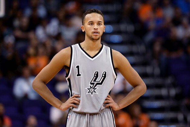 Oct 16, 2014; Phoenix, AZ, USA; San Antonio Spurs guard Kyle Anderson (1) looks up the court in the game against the Phoenix Suns at US Airways Center. Mandatory Credit: Jennifer Stewart-USA TODAY Sports