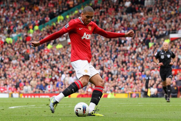 MANCHESTER, ENGLAND - AUGUST 28:  Chris Smalling of Manchester United with the ball during the Barclays Premier League match between Manchester United and Arsenal at Old Trafford on August 28, 2011 in Manchester, England.  (Photo by Alex Livesey/Getty Images)