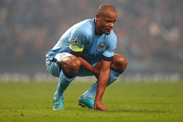MANCHESTER, ENGLAND - NOVEMBER 05:  Vincent Kompany of Manchester City looks dejected during the UEFA Champions League Group E match between Manchester City and CSKA Moscow on November 5, 2014 in Manchester, United Kingdom.  (Photo by Alex Livesey/Getty Images)