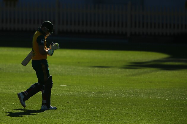 SYDNEY, AUSTRALIA - NOVEMBER 02: David Miller of South Africa walks off the field after being dismissed by James Bazley of Australia during the Men's International Tour Twenty20 match between the Cricket Australia XI and South Africa at North Sydney Oval on November 2, 2014 in Sydney, Australia.  (Photo by Joosep Martinson/Getty Images)