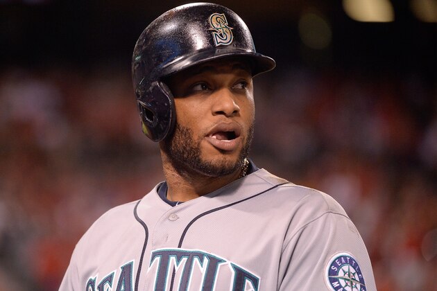 ANAHEIM, CA - JULY 18:  Robinson Cano #22 of the Seattle Mariners reacts as he heads back to the bench after he was called out on a video review during the 10th inning against the Los Angeles Angels at Angel Stadium of Anaheim on July 18, 2014 in Anaheim, California.  (Photo by Harry How/Getty Images)