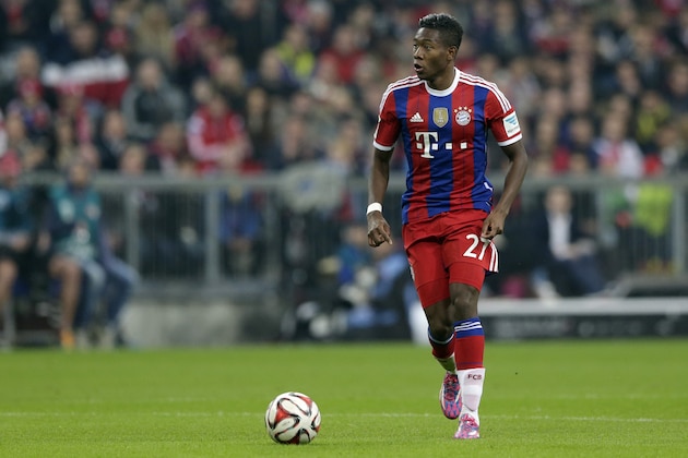 Bayern's David Alaba from Austria controls the ball during the German first division Bundesliga soccer match between FC Bayern and Borussia Dortmund in the Allianz Arena in Munich, Germany, on Saturday, Nov. 1, 2014. (AP Photo/Matthias Schrader)